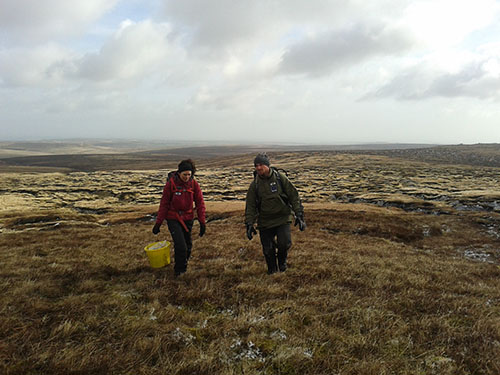 Two workers at Bleaklow