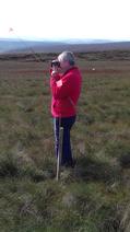 Picture of volunteer Tom Helliwell working on the moors 