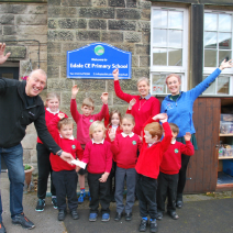 Children at Edale School celebrating money raised 