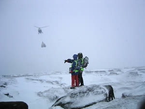 Helicopter airlifting projects in the winter