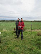 Two members of the team flying the Unmanned Aerial Vehicle