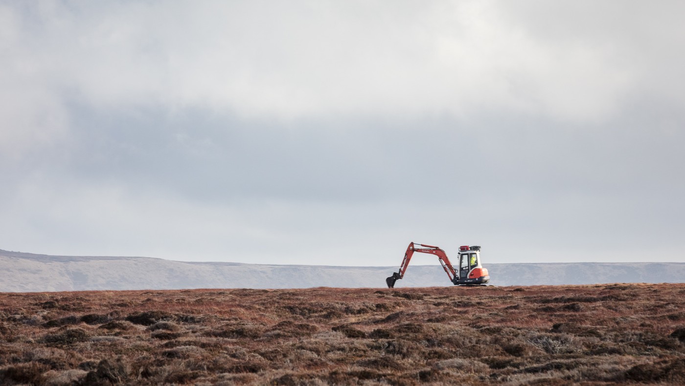 Digger on moor